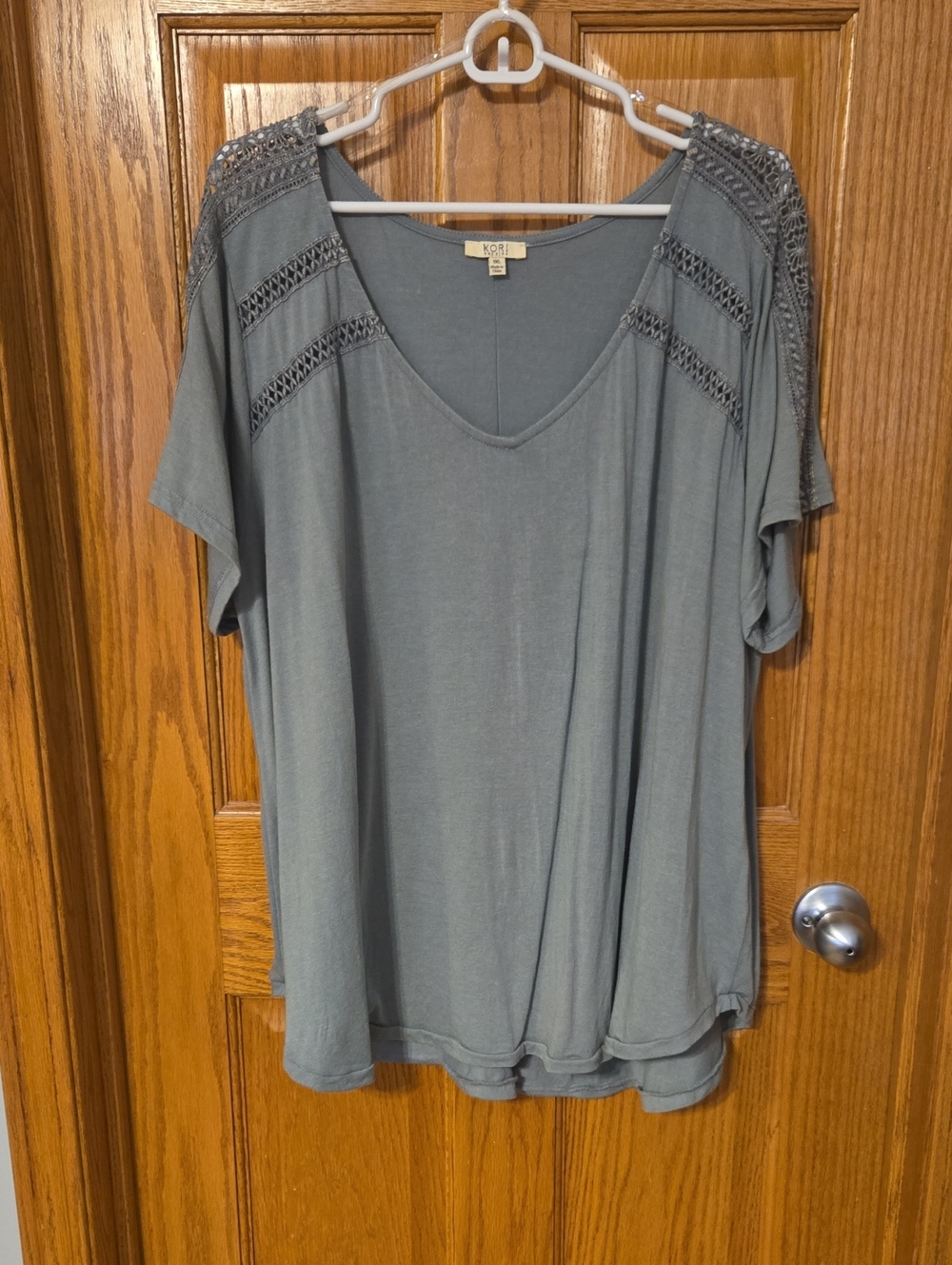 Kori Dusty Sage Short Sleeve V-Neck Top with Crochet Shoulders